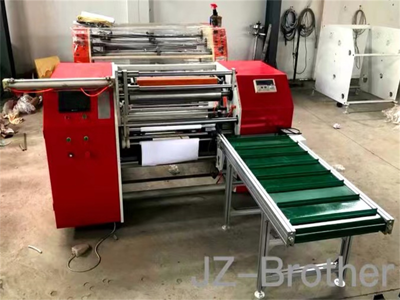 Coreless baking paper rewinder