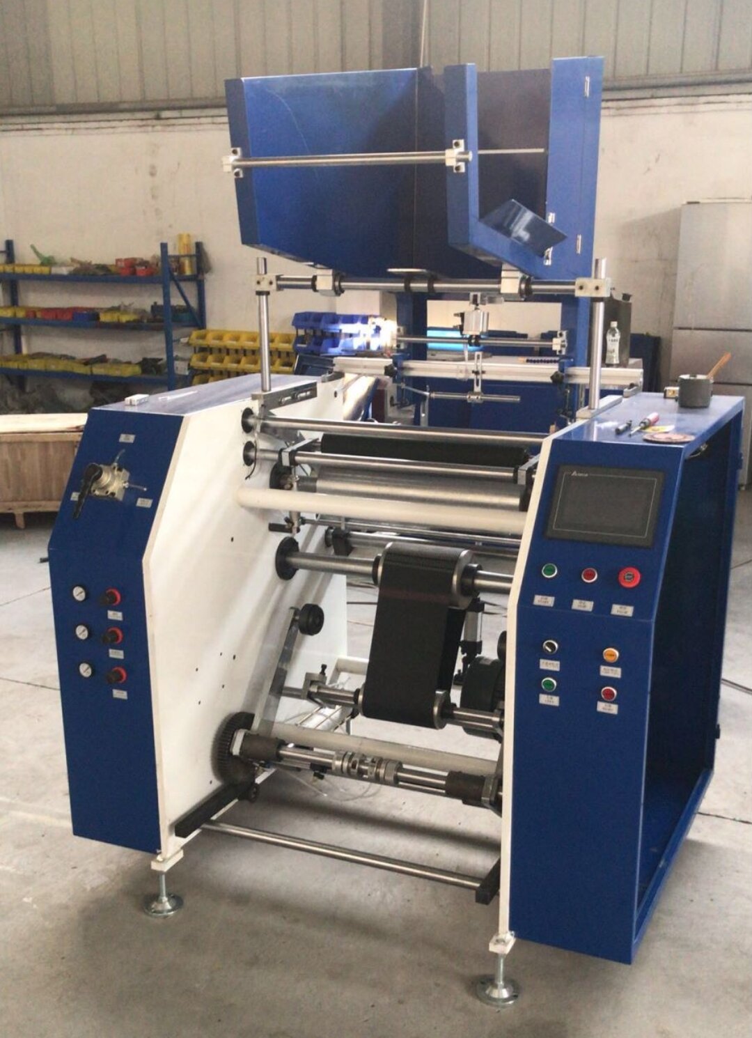 Automatic stretch film rewinder