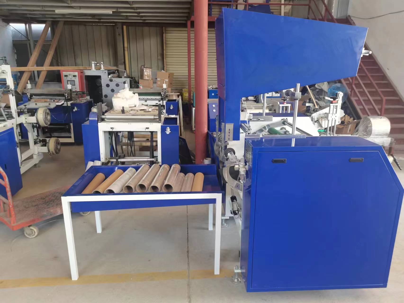 Automatic stretch film rewinder