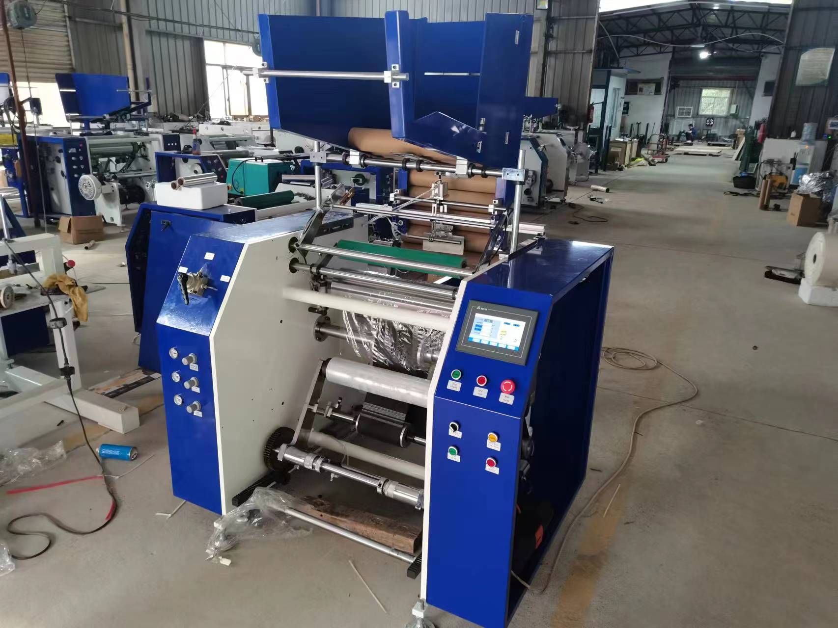 Automatic stretch film rewinder