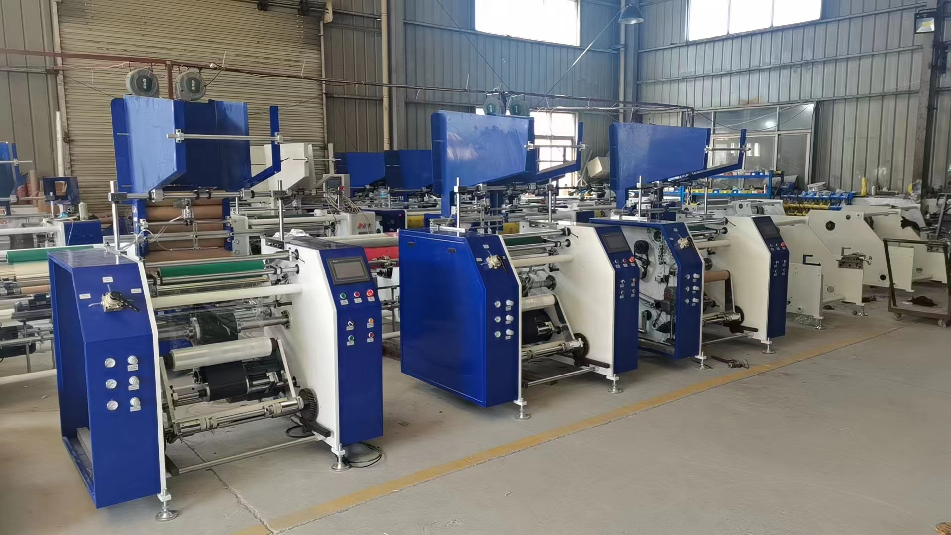 Automatic stretch film rewinder